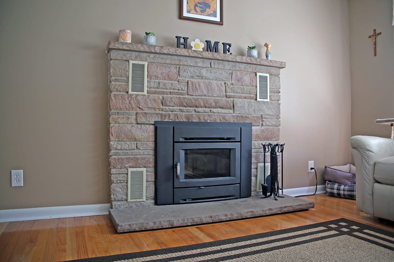 Original image of completed fireplace insert installation done by Mercer County Chimney Service.